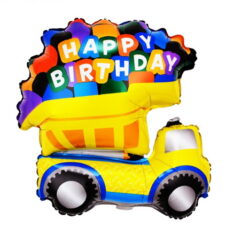 Suur kollane täispuhutud õhupall kastiauto kujuga, mille kastis on kirjutatud happy birthday.