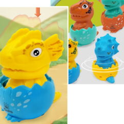 Sinises munakoores istuv väike kollane dinosaurus, mis hakkab sõitam kui tema pea peale vajutada.