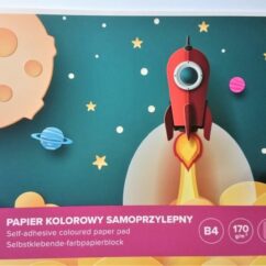 Värviline paber plokis mille rohelisel kaaanel on punane rakett õhku tõusmas.